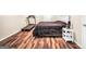 This bedroom boasts a treadmill and comfortable space for relaxation and wellness at 186 Ashley Dr, Mcdonough, GA 30252
