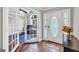 Bright foyer with tiled floor, white trim, and French doors leading to the office at 186 Ashley Dr, Mcdonough, GA 30252