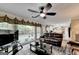 Bright living room showcasing a view of the backyard and a comfortable seating area at 3034 Brookgreen Trl, Lawrenceville, GA 30043