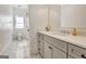 Bathroom boasts stylish tile flooring and a vanity with modern fixtures at 5187 Lower Fayetteville Rd, Sharpsburg, GA 30277
