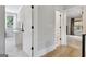 Hallway view featuring natural light and interior doors at 5187 Lower Fayetteville Rd, Sharpsburg, GA 30277