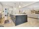 Beautiful kitchen showcasing a center island, stainless appliances, and seamless flow at 5187 Lower Fayetteville Rd, Sharpsburg, GA 30277