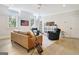Open living room with plenty of natural light, perfect for relaxing and entertaining at 5187 Lower Fayetteville Rd, Sharpsburg, GA 30277