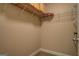 Walk-in closet with shelving ready for organizing personal items at 1041 Flat Rock Rd, Covington, GA 30014