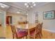 Elegant dining room featuring hardwood floors and a modern chandelier at 1041 Flat Rock Rd, Covington, GA 30014