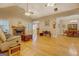 Spacious living room with hardwood floors, fireplace, and open floor plan at 1041 Flat Rock Rd, Covington, GA 30014