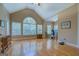 Spacious living area with hardwood floors, lots of natural light, and a vaulted ceiling at 1041 Flat Rock Rd, Covington, GA 30014