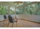 Relax on this screened porch with beautiful views at 1041 Flat Rock Rd, Covington, GA 30014