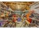 Unfinished storage area featuring exposed beams and shelving at 1041 Flat Rock Rd, Covington, GA 30014