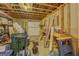 Unfinished storage area with exposed beams and plenty of space at 1041 Flat Rock Rd, Covington, GA 30014
