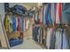 Large walk-in closet with built-in shelving and ample storage space for clothes and accessories at 1041 Flat Rock Rd, Covington, GA 30014