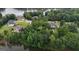 Scenic aerial view of a lakeside community with lush landscaping and beautiful homes at 81 Smokerise Pt, Peachtree City, GA 30269