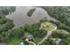 Lakeside community with luxury homes and well-manicured landscapes surrounded by nature at 81 Smokerise Pt, Peachtree City, GA 30269