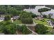 Scenic aerial view of a lakeside community with lush landscaping and beautiful homes at 81 Smokerise Pt, Peachtree City, GA 30269