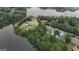 Aerial view showcasing real estate on a point with gorgeous homes and lake access at 81 Smokerise Pt, Peachtree City, GA 30269