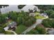 Scenic aerial view of a lakeside community with lush landscaping and beautiful homes at 81 Smokerise Pt, Peachtree City, GA 30269