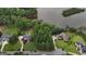 Aerial view showcasing the natural beauty of the real estate, lake, and lush green landscape at 81 Smokerise Pt, Peachtree City, GA 30269
