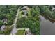 An aerial view of the real estate neighborhood with lush green trees and surrounding properties at 81 Smokerise Pt, Peachtree City, GA 30269
