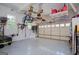 Spacious garage featuring ample storage, windows, and room for multiple vehicles at 7003 Tara Dr, Villa Rica, GA 30180
