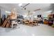 Finished garage featuring ample lighting, workbenches, a projector, and lots of outlets at 7003 Tara Dr, Villa Rica, GA 30180