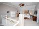 Spacious main bedroom featuring a ceiling fan, sitting area, and ensuite entrance at 7003 Tara Dr, Villa Rica, GA 30180