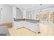 Spacious kitchen with white cabinetry and tile flooring at 180 Rock Hill Dr, Fayetteville, GA 30215