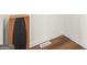 Minimal corner features a speaker, wood floors, and vent at 180 Rock Hill Dr, Fayetteville, GA 30215