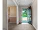 Open entryway with a view to the backyard, showcasing a bright and airy entrance to the home at 185 Downybrook Ln, Fayetteville, GA 30215