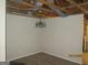 Unfinished dining room featuring rustic chandelier and open stud walls at 101 Pinetree Trl, Atlanta, GA 30349
