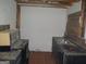 Dated kitchen featuring dark cabinets at 101 Pinetree Trl, Atlanta, GA 30349