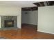 Living room featuring a stone fireplace and tiled flooring, providing a relaxing environment at 101 Pinetree Trl, Atlanta, GA 30349