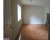 Bright living area featuring tiled flooring and a window, offering a clean and modern look at 101 Pinetree Trl, Atlanta, GA 30349