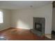 Living room featuring a stone fireplace, tile floors, and natural light at 101 Pinetree Trl, Atlanta, GA 30349