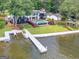 Waterfront property featuring a modern home with a private dock and stunning water views at 2775 Club Valley Ct, Jonesboro, GA 30236