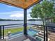 Breathtaking balcony view of a pool and lake, perfect for relaxation and scenic enjoyment at 2775 Club Valley Ct, Jonesboro, GA 30236