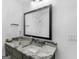 Elegant bathroom vanity with granite countertop, modern fixtures, and ample lighting at 2775 Club Valley Ct, Jonesboro, GA 30236