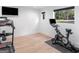 Bright home gym with exercise equipment and a large window offering natural light at 2775 Club Valley Ct, Jonesboro, GA 30236