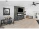 Bright and airy living room with modern fireplace, light hardwood floors, and plenty of space at 2775 Club Valley Ct, Jonesboro, GA 30236