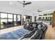 Lounge featuring comfortable seating, a lake view, and access to the patio for relaxing outdoors at 2775 Club Valley Ct, Jonesboro, GA 30236