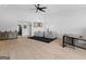 Open-concept living room with ample seating and stylish furnishings in a modern design at 2775 Club Valley Ct, Jonesboro, GA 30236