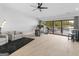 Contemporary living room offers a comfortable seating area, lake views, and modern finishes at 2775 Club Valley Ct, Jonesboro, GA 30236
