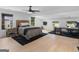 Spacious main bedroom with natural light, hardwood floors, and ample workspace at 2775 Club Valley Ct, Jonesboro, GA 30236