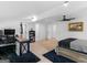 Bright and airy main bedroom featuring hardwood floors, a ceiling fan, and modern decor at 2775 Club Valley Ct, Jonesboro, GA 30236