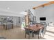 Bright, open-concept kitchen and living area featuring modern design, hardwood floors, and high ceilings at 2775 Club Valley Ct, Jonesboro, GA 30236