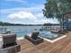 Stunning infinity pool and hot tub overlooking a serene lake, perfect for outdoor entertaining at 2775 Club Valley Ct, Jonesboro, GA 30236
