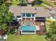 Luxury home featuring an outdoor pool, hot tub, and deck perfect for entertaining and relaxation at 2775 Club Valley Ct, Jonesboro, GA 30236