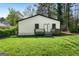 A quaint backyard of a home with healthy green grass at 437 Collier Ridge Nw Dr, Atlanta, GA 30318