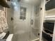 Tiled glass shower with a window and built in bench at 155 Central Ave, Fayetteville, GA 30214