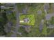 Aerial view of property and neighborhood highlighting lot size and surrounding landscape at 3511 Cherry Blossom Ct, Loganville, GA 30052