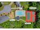 Aerial view of amenities featuring pool, playground, pickle ball and tennis courts in the community at 3511 Cherry Blossom Ct, Loganville, GA 30052